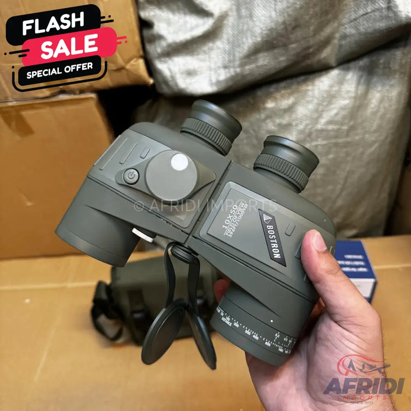 Olive green digital binoculars with built-in rangefinder and compass.