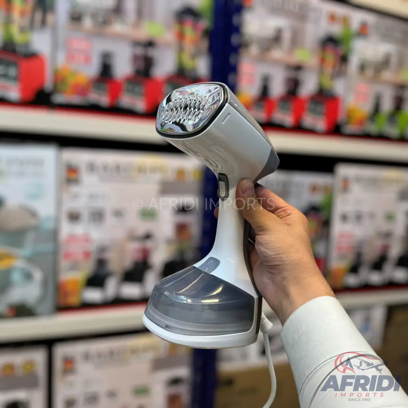Handheld garment steamer with a white body and a translucent gray water tank.