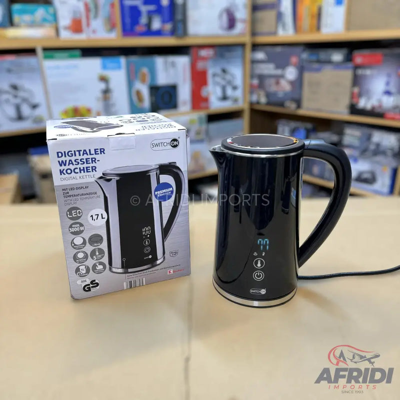 Black digital electric kettle with a 1.7-liter capacity.