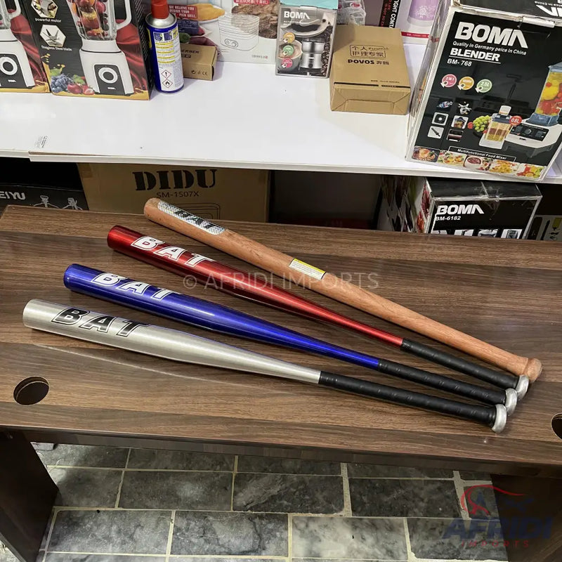 Four baseball bats in different colors and materials.