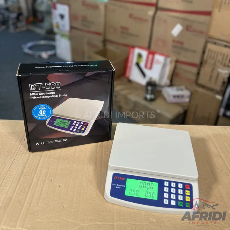 Electronic price-computing scale with a digital display and keypad.