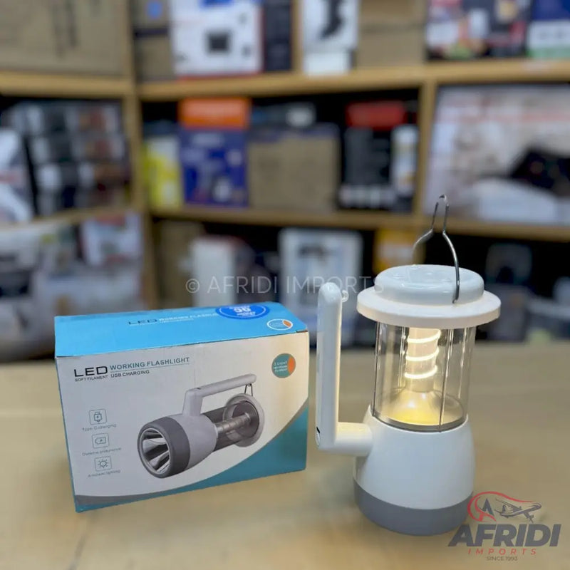 A dual-function LED light, combining a flashlight and a lantern with a spiral filament, and its product packaging.