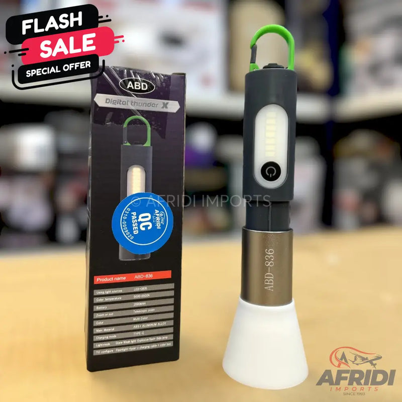 A portable, multi-functional electric device with a flashlight and a power bank, featuring a green carabiner clip and a white conical base.