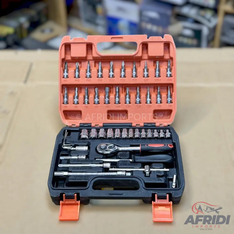 An open orange and black toolbox containing various screwdriver bits, sockets, and a ratchet.
