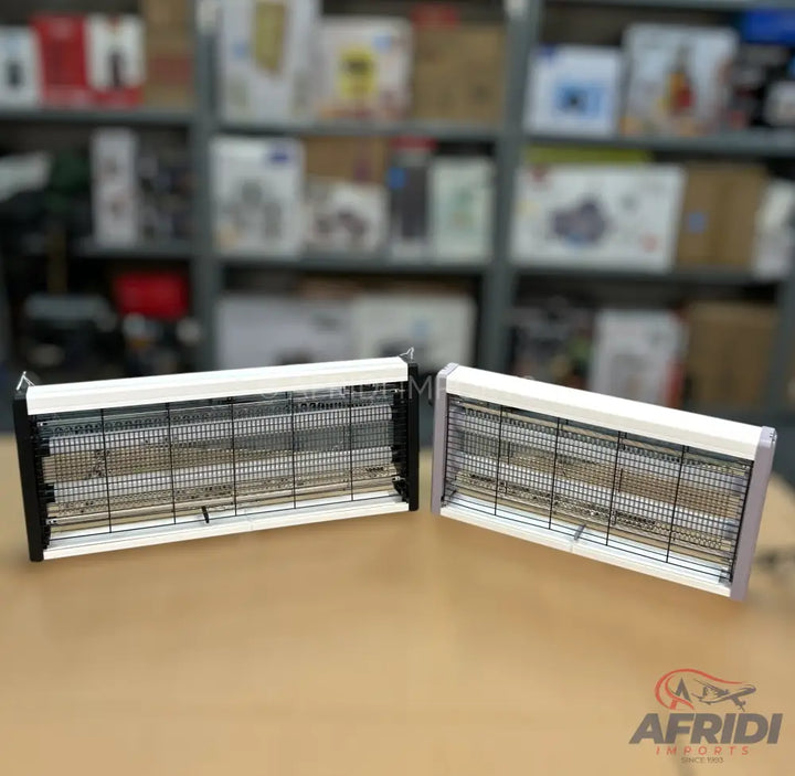 Two rectangular electric insect killers with white and black frames.