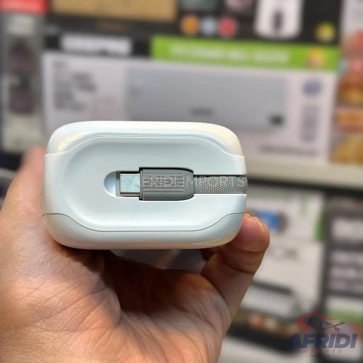White power bank with an integrated gray USB-C cable.