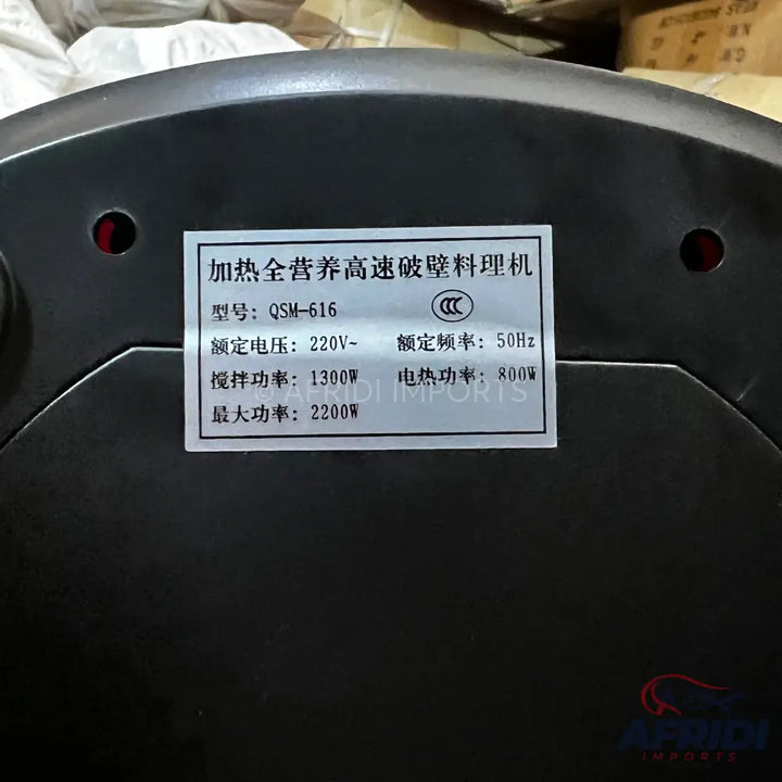 An electric blender with a Chinese label detailing its specifications.