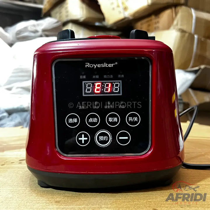 Red digital blender with various function buttons.