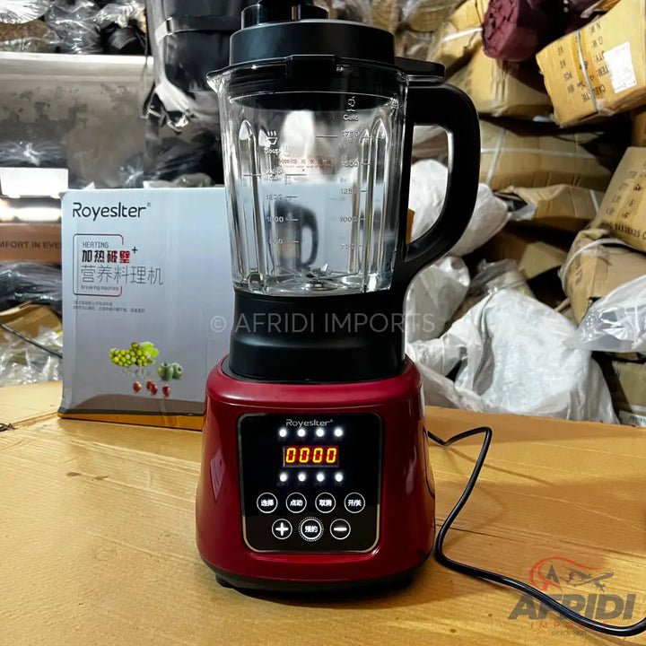 Red electric blender with a glass pitcher and a digital control panel.