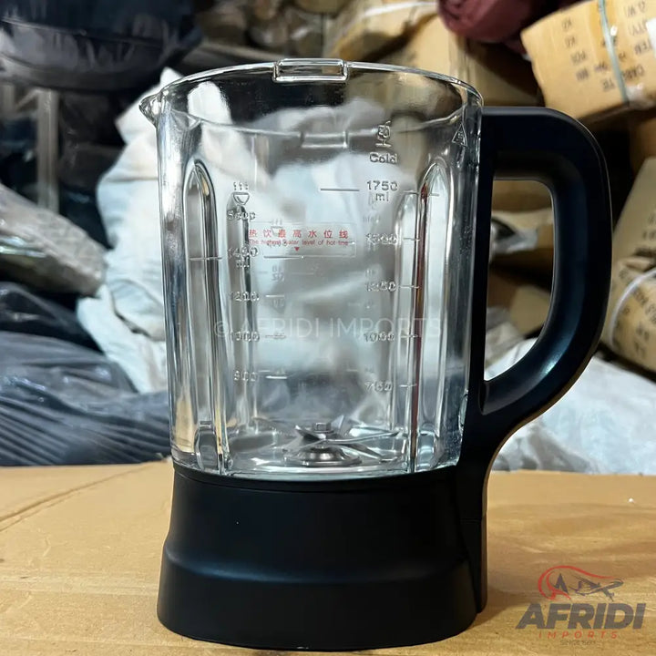 Clear glass blender jar with a black handle and base, featuring measurement markings up to 1750 ml.
