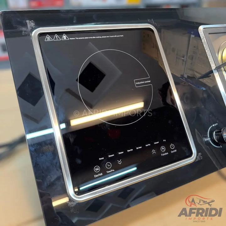 Black glass-top induction cooktop with touch controls and a single burner.