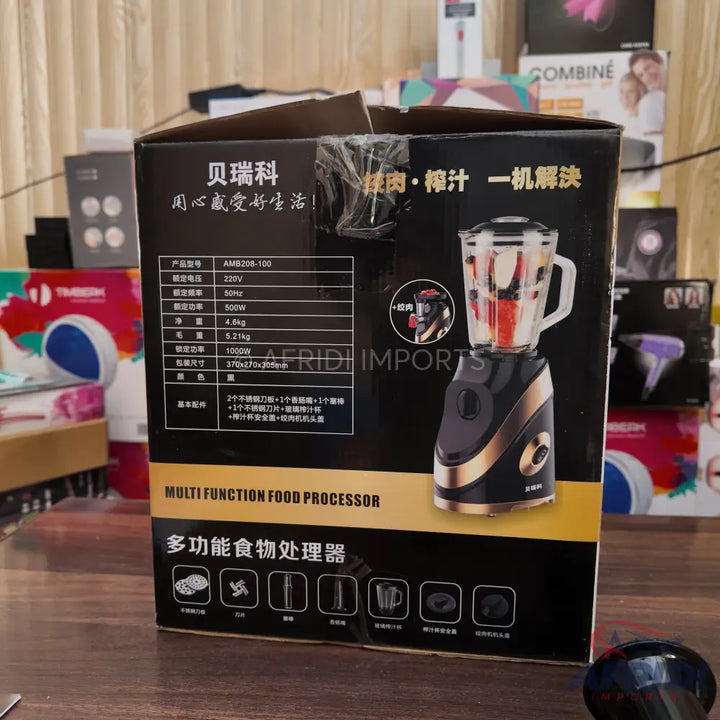 Black and gold multi-function food processor with a transparent blending jar.
