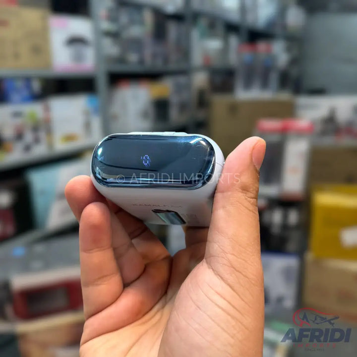 A white wireless earbud charging case with a transparent lid displaying a blue Bluetooth symbol.