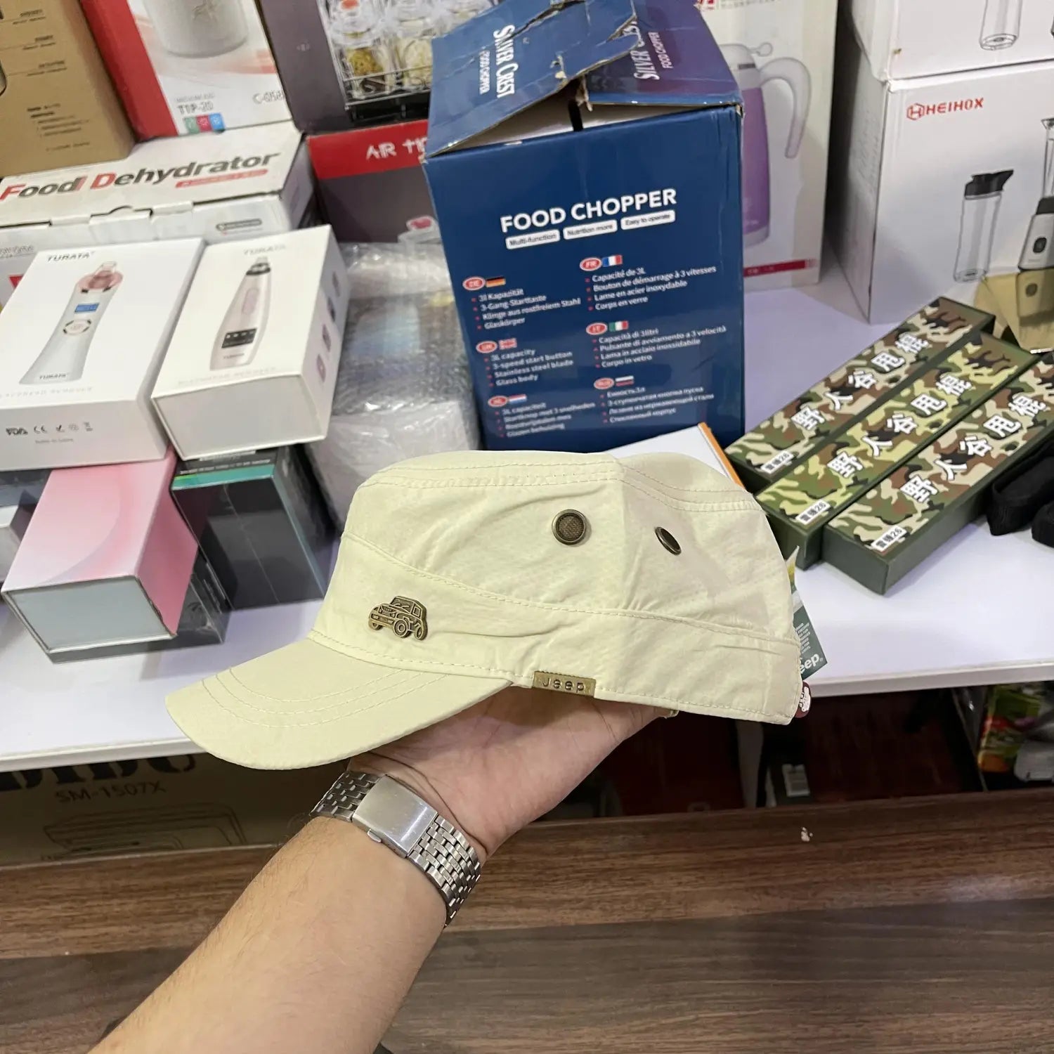 Beige military-style cap with metal Jeep emblem from Lot Imported Jeep collection