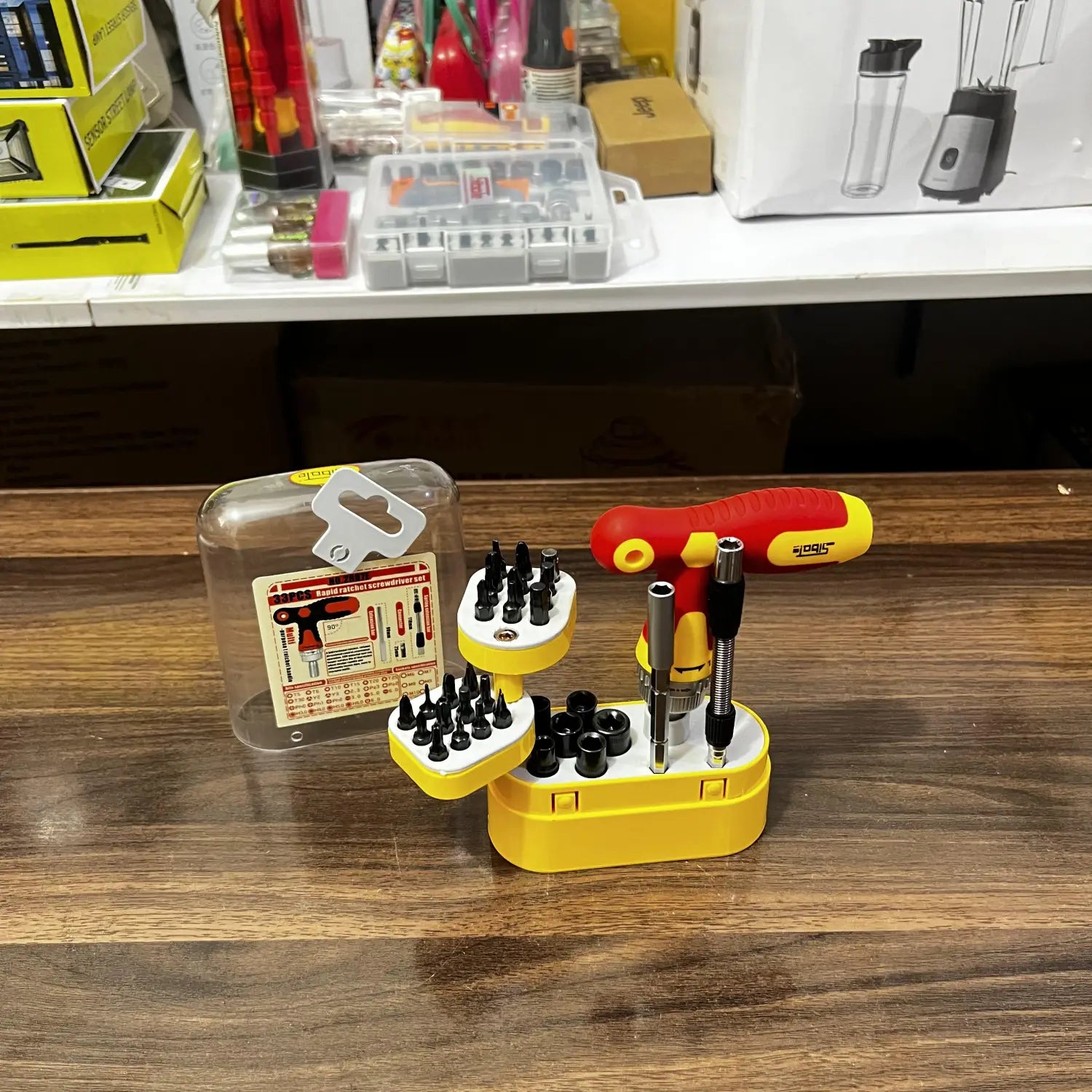 Yellow and red 33 pcs screwdriver kit with interchangeable bits from Lot Imported