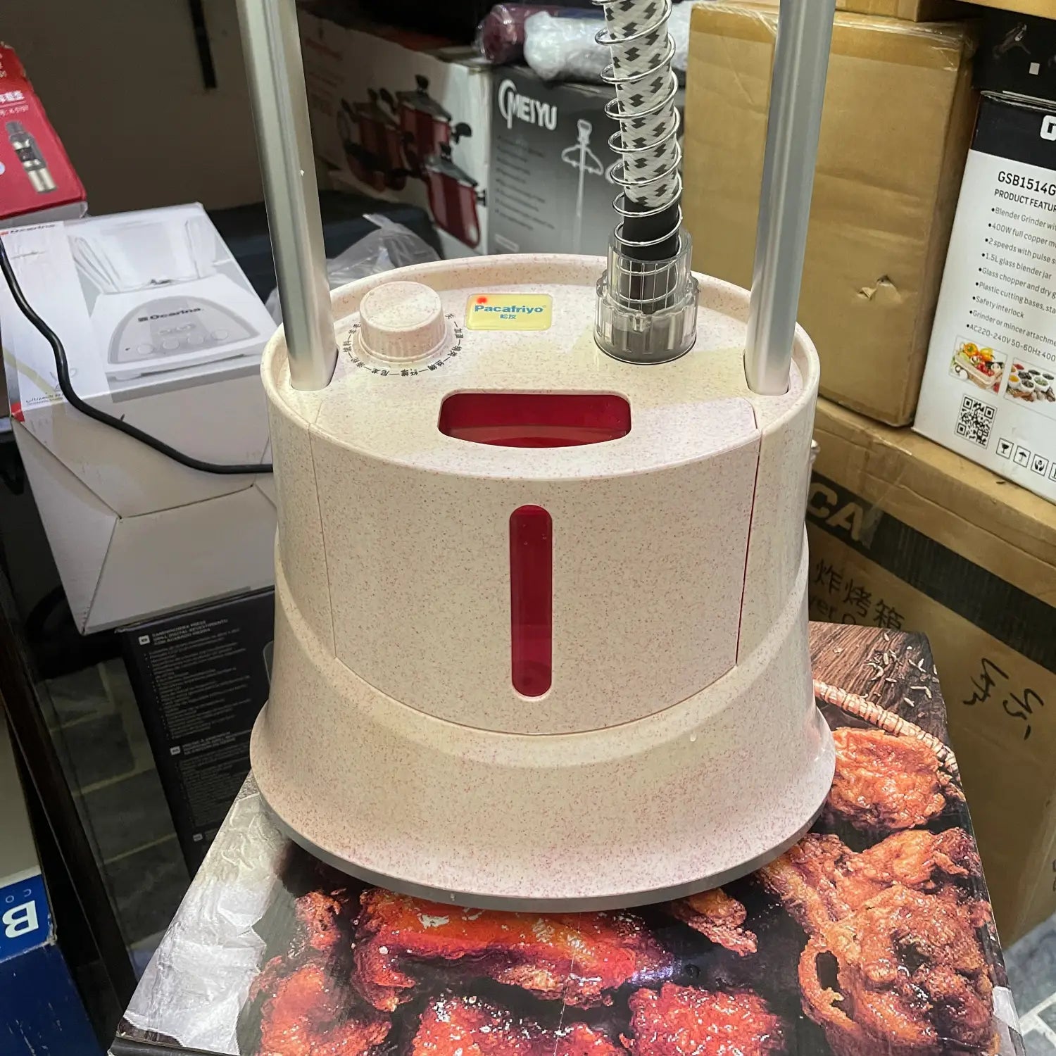 Light pink floor-standing professional garment steamer with water level indicator