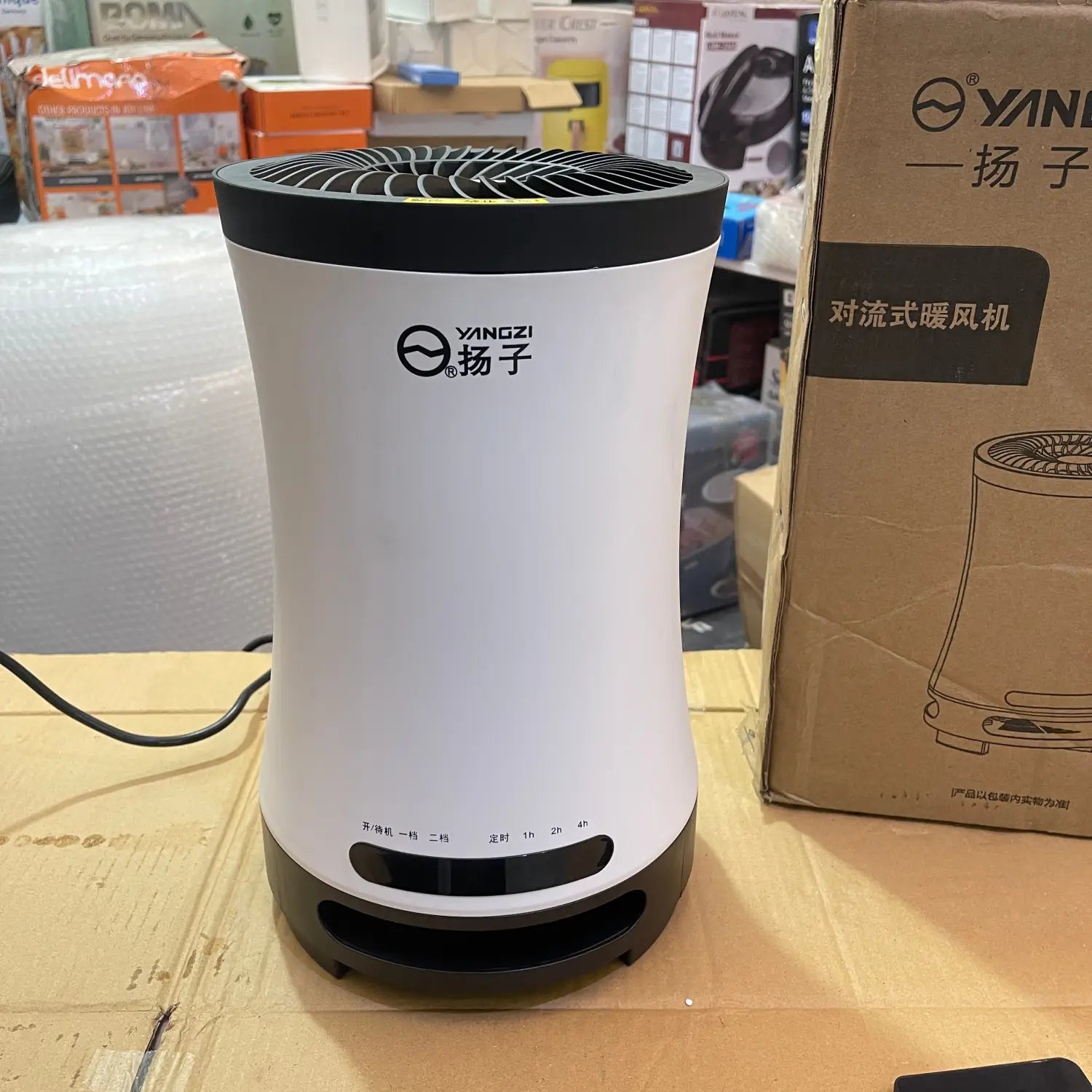 White and black cylindrical convection electric heater from Lot Imported Yangzi Electric Heater series
