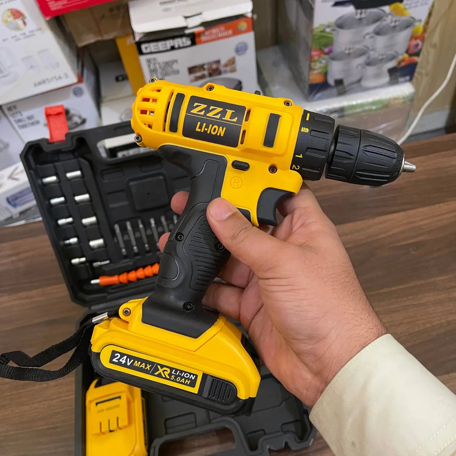 Yellow and black 24V drill with Li-ion battery from Lot Imported ZZL product line