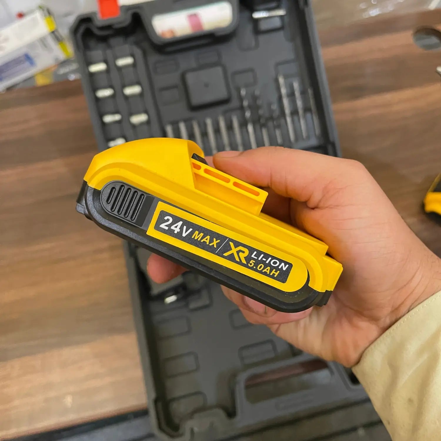 Yellow and black lithium-ion battery for 24V drill machine ZZL power tools.
