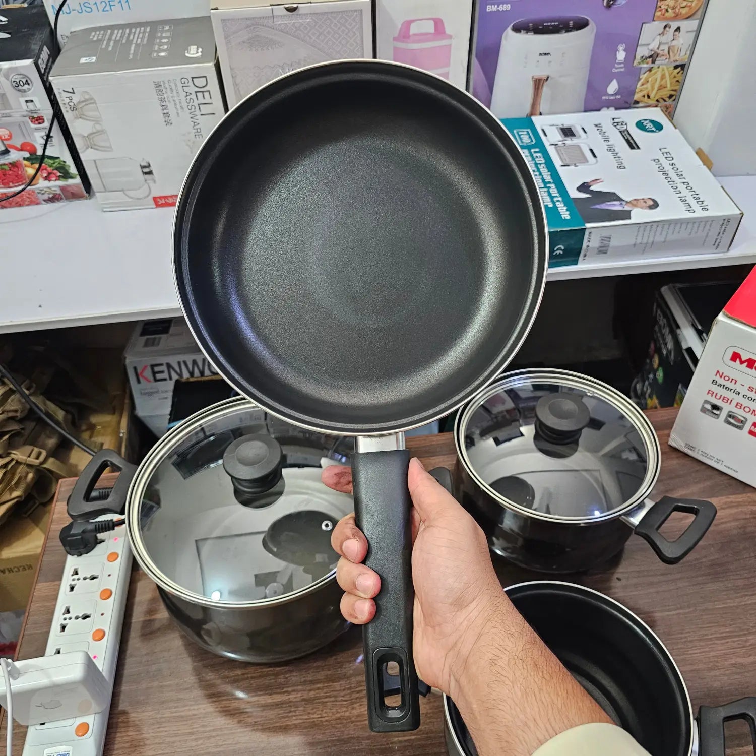 Black non-stick frying pan with black handle from German Lot Imported Megafesa cookware set