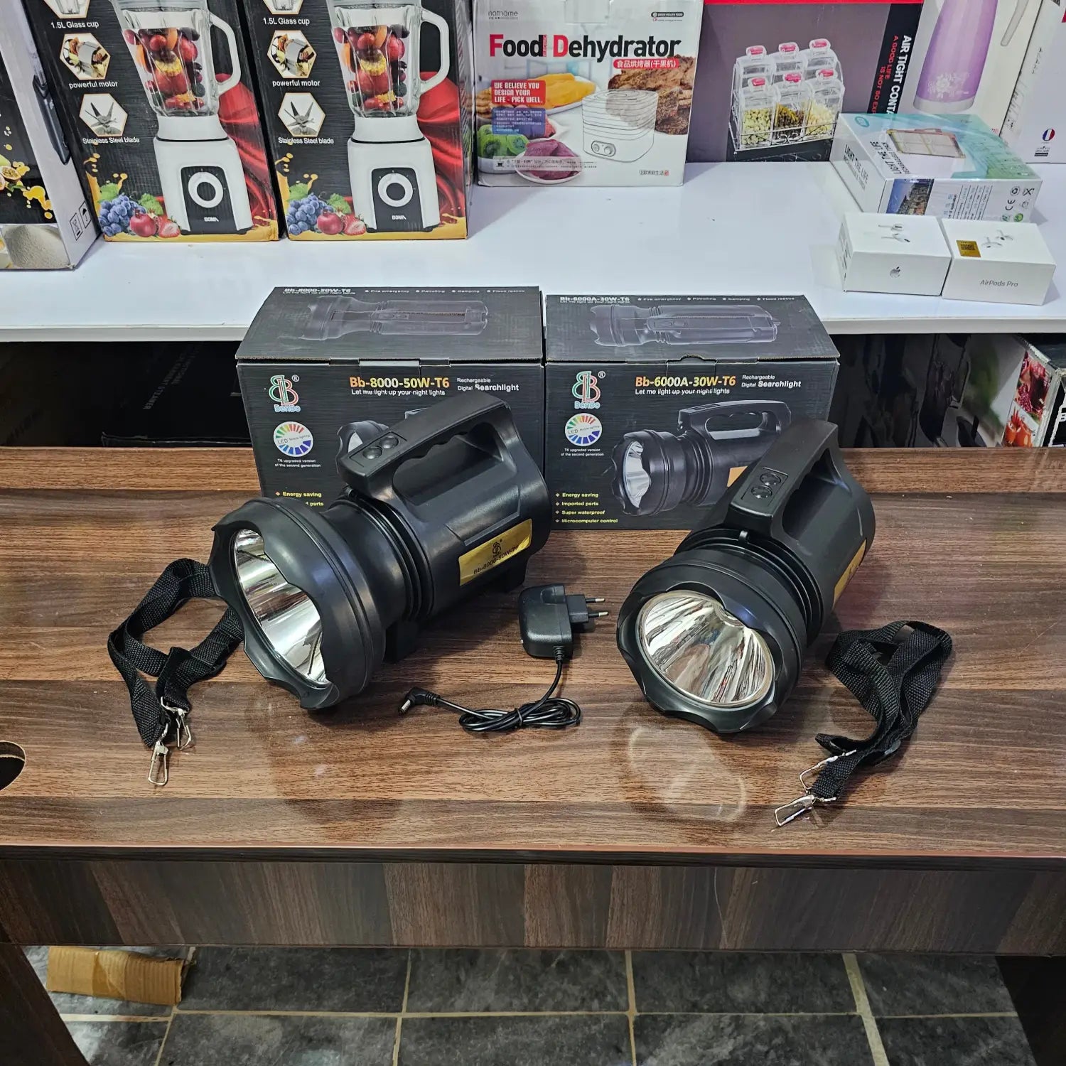 Rechargeable 30W and 50W Searchlights with adjustable straps and charging units