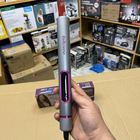 Gray and pink professional hair straightener with digital display from Babyverse