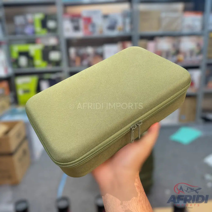 An olive green, rectangular zippered hard case.