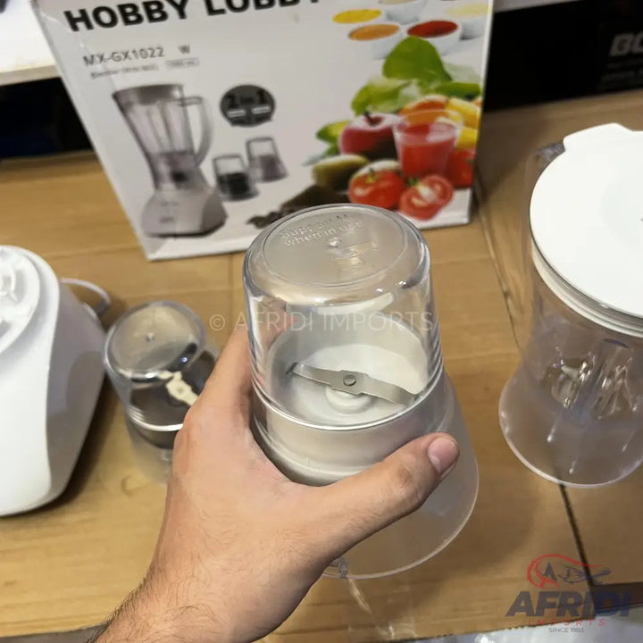 A multi-purpose blender with several attachments.