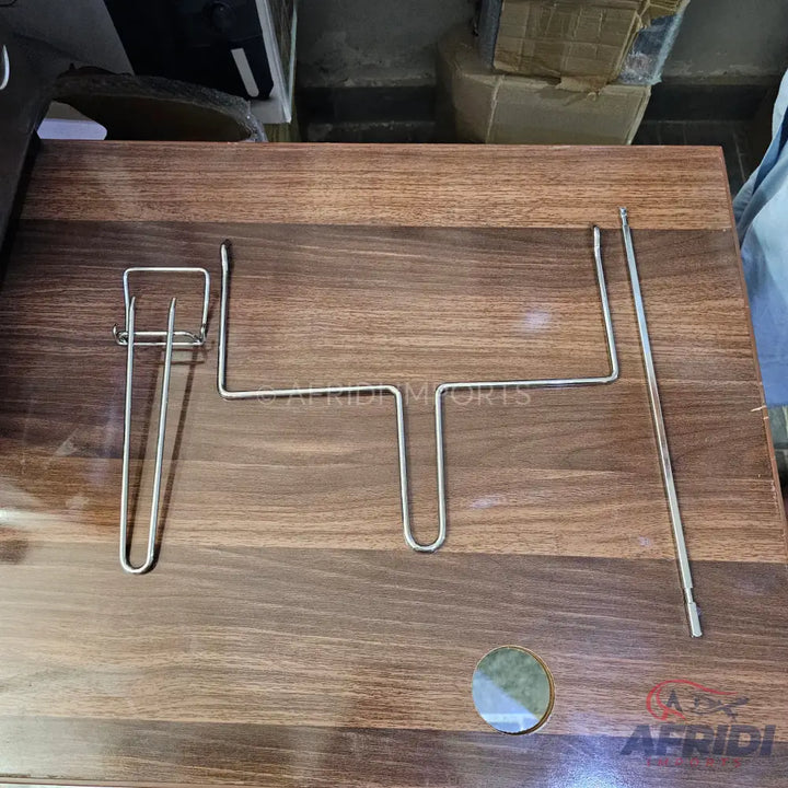 Stainless steel rotisserie grill kit for an oven.