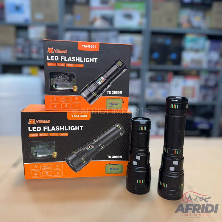 Two black LED flashlights and their packaging.