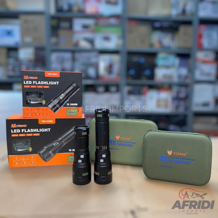 Two black LED flashlights and their packaging.
