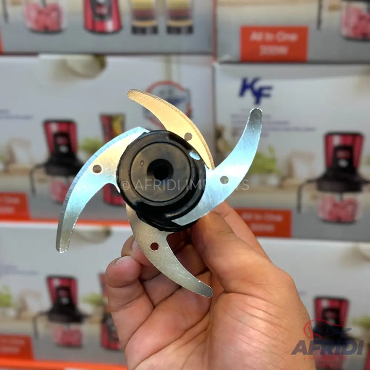 A four-blade food processor attachment.