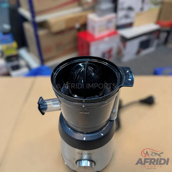 A shiny silver and black electric citrus juicer with a transparent pulp collector.