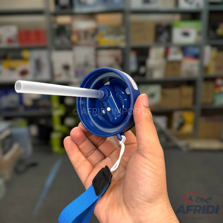 A blue plastic water bottle lid with an integrated straw and a blue fabric carrying strap.