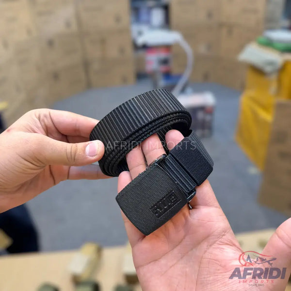 A black tactical belt with a textured buckle.