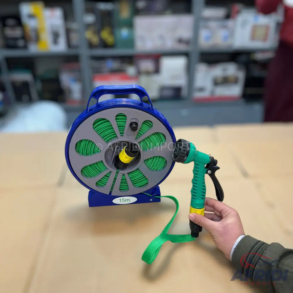 A blue hose reel with green hose and a multi-function spray nozzle.