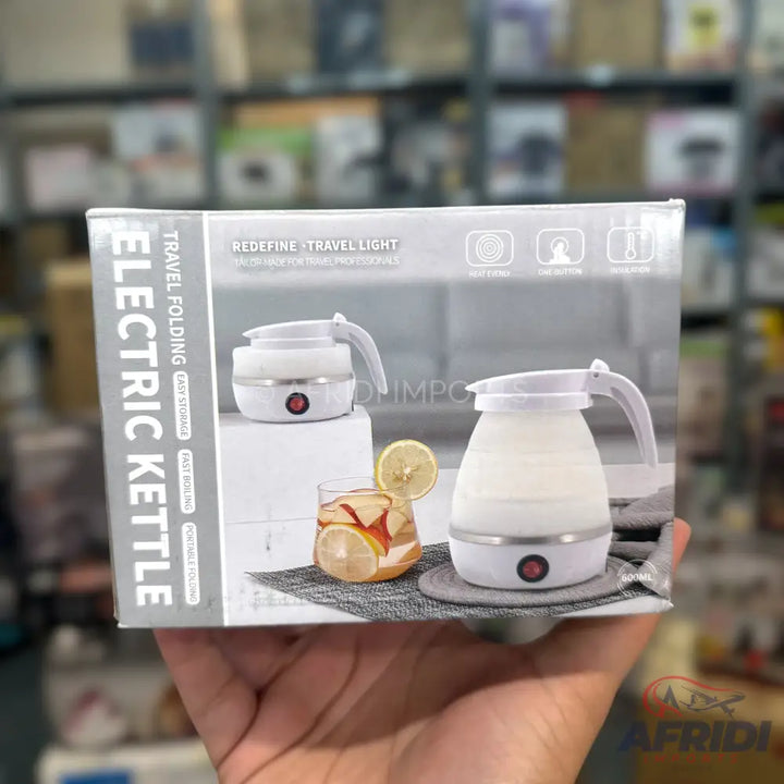 White travel folding electric kettle.