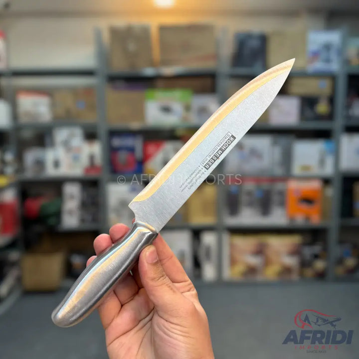 Stainless steel chef’s knife with a polished metallic handle.