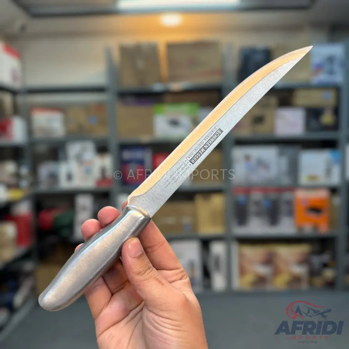 A stainless steel boning knife with a curved blade and a polished handle.