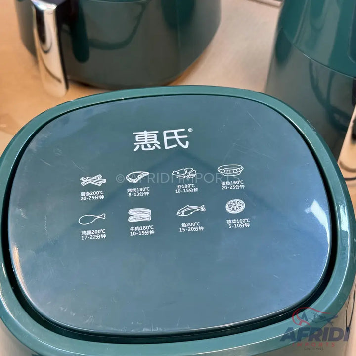 Dark green air fryer with cooking presets.