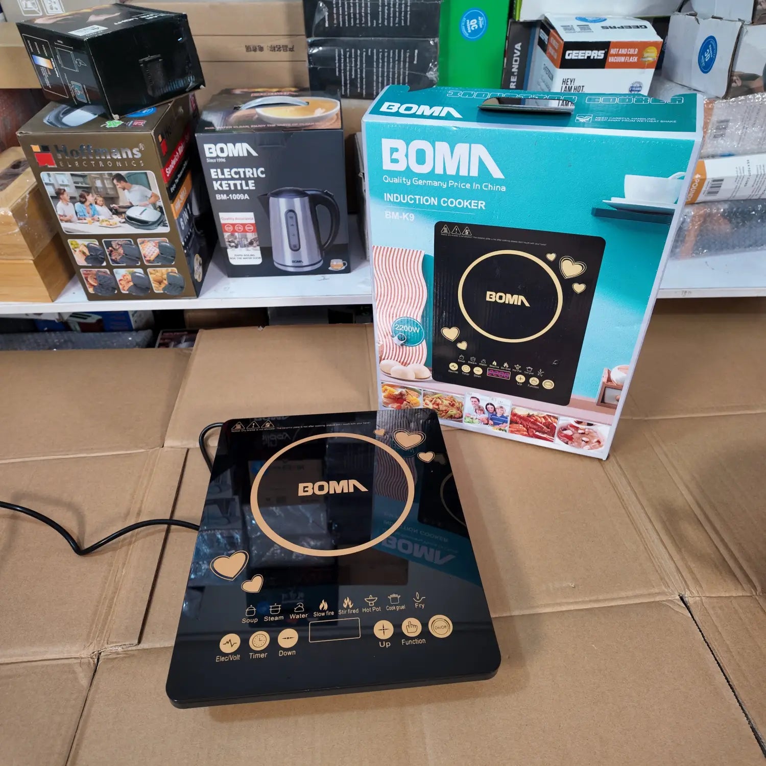 Imported German Lot Boma Induction Cooker BM-K9 with black finish, golden accents, digital display