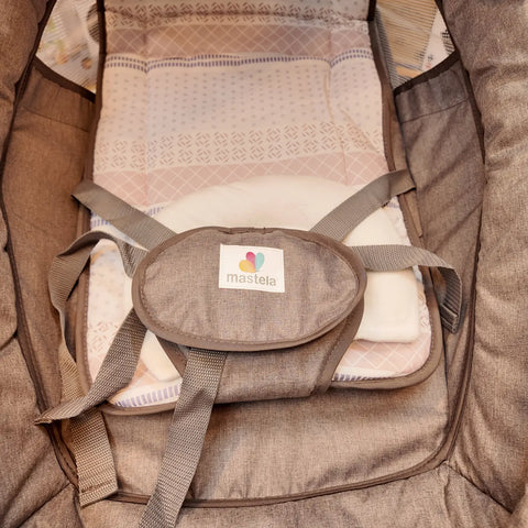 Brown imported Mastela Electric Baby Swing with patterned insert and safety harness