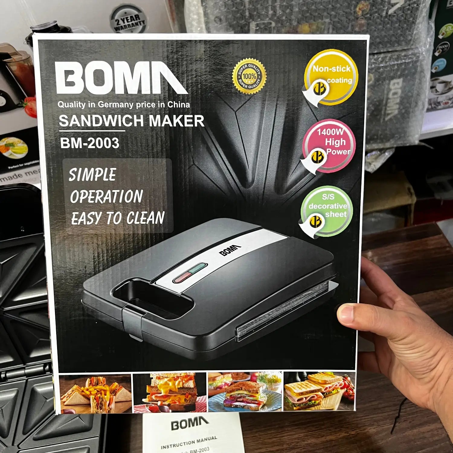 Black electric slice sandwich maker with non-stick coating, 1400W power, imported Boma