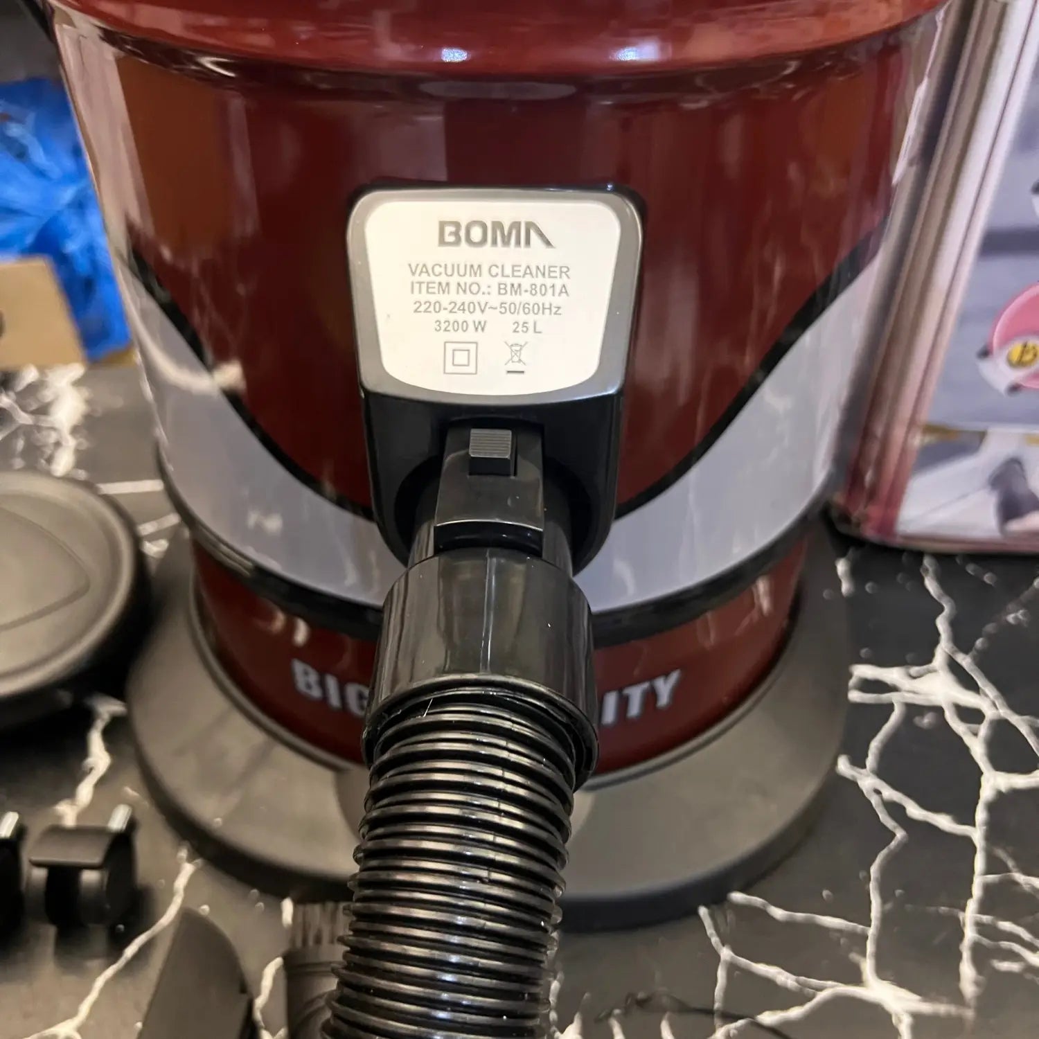 Red and black Boma 25L Turbo Vacuum Cleaner with hose connection, imported German lot