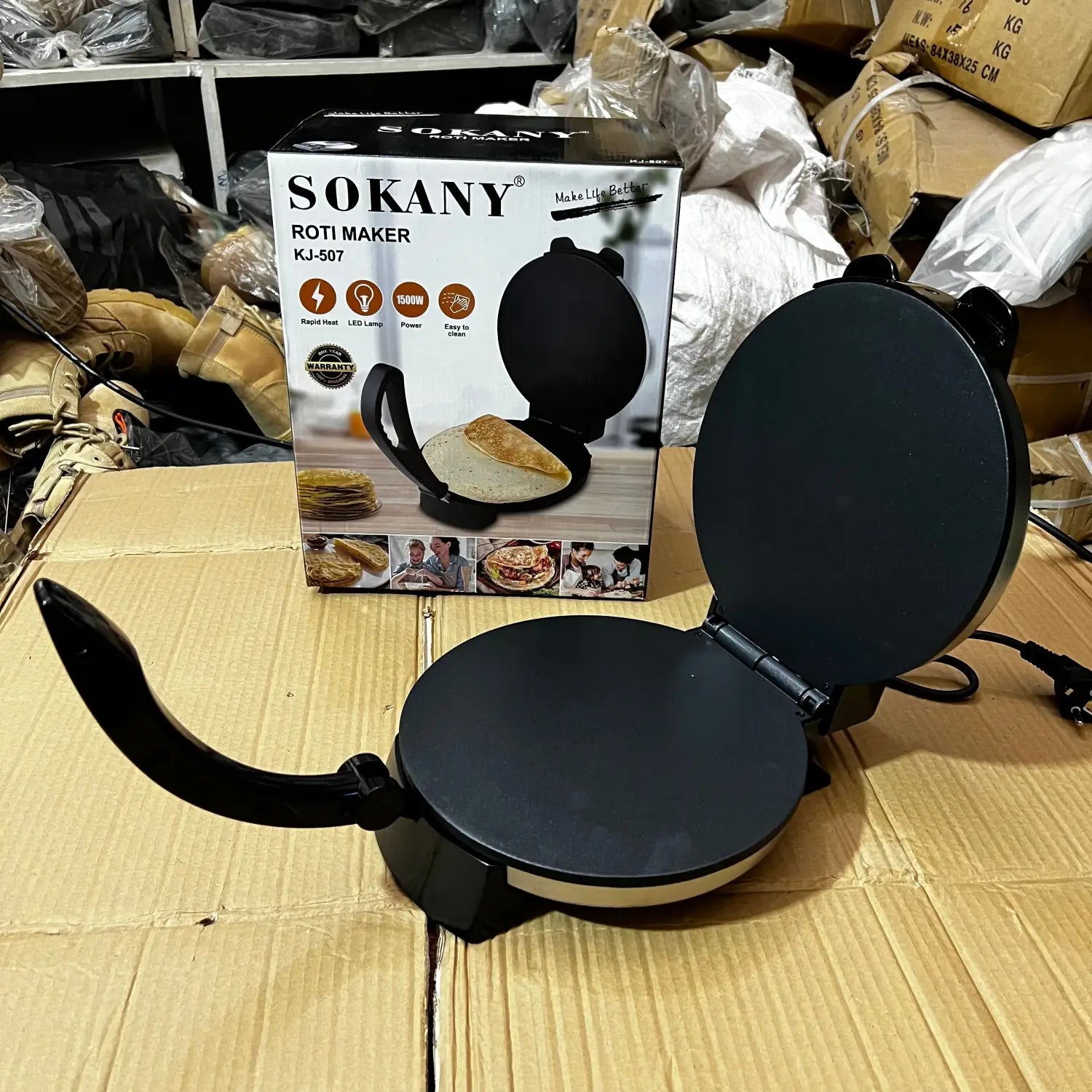 Black electric Roti Maker with non-stick surface and heat resistant plastic body