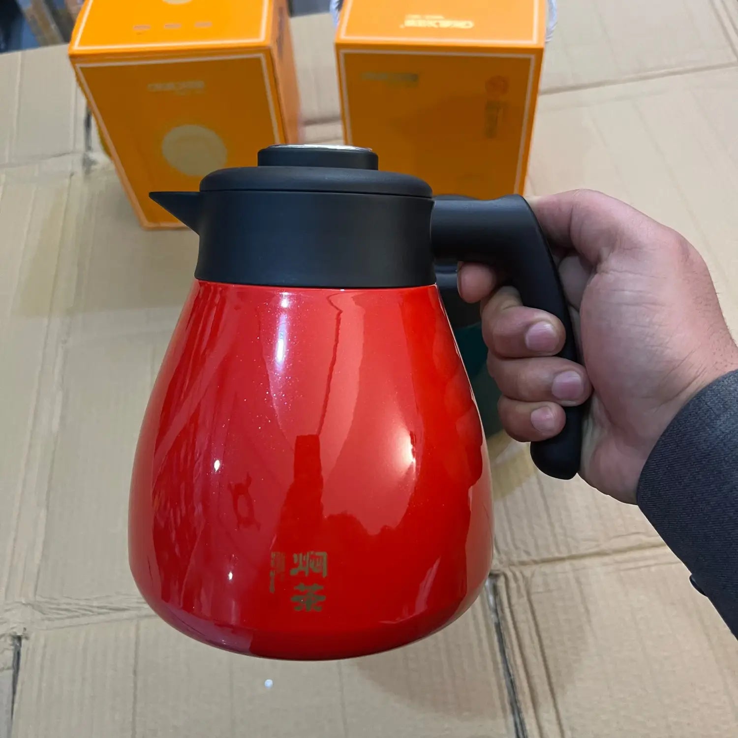 Red teardrop-shaped imported 1500ml thermose with black handle and lid for thermal carafe