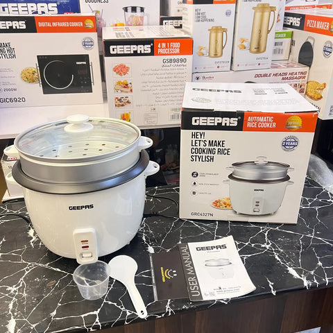 White electric rice cooker with glass lid and steaming basket from Geepas with warranty