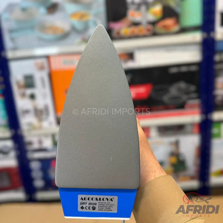 A gray and blue dry iron with a pointed tip.