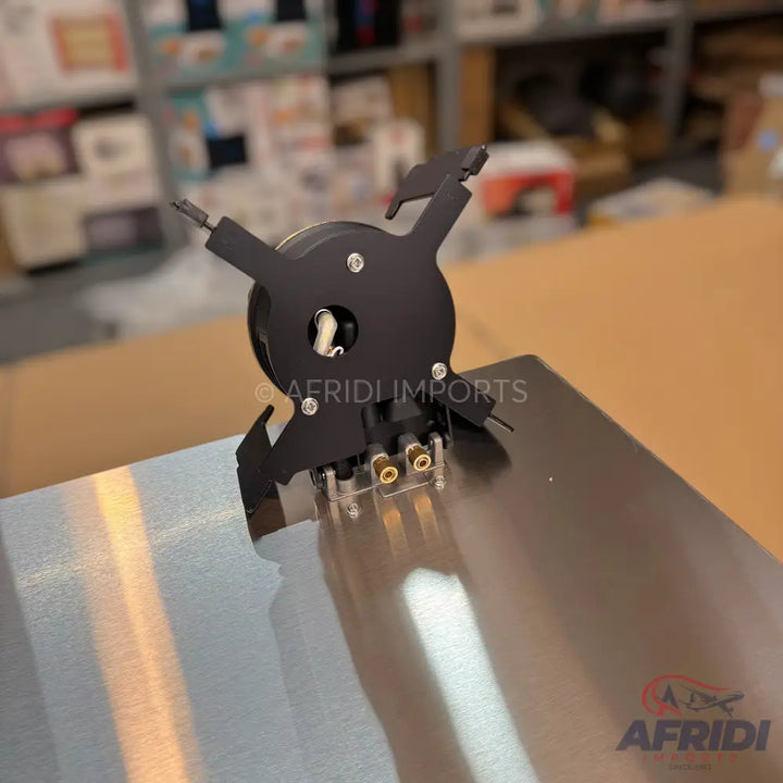 Black metal projector mount with adjustable arms and golden connectors.