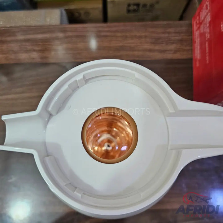 White plastic ashtray with a central metal-lined well.